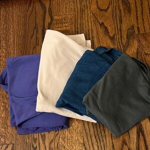 LULULEMON Set of Four racer back tank tops. Sizes 8-10